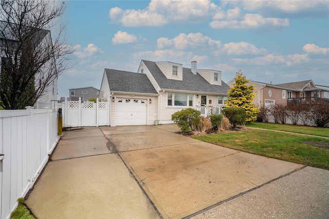 view of front facade with a front lawn and a garage