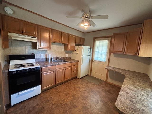 kitchen featuring decorative backsplash, ceiling fan, sink, and white appliances