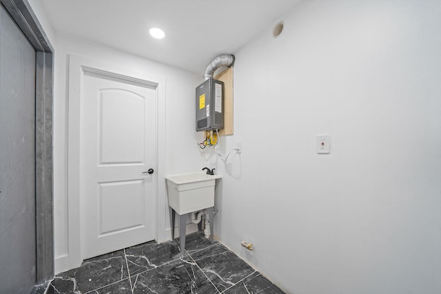 washroom featuring water heater