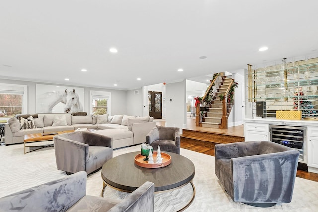 living room featuring light hardwood / wood-style flooring and beverage cooler