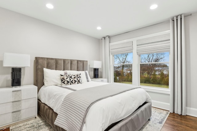 bedroom featuring hardwood / wood-style floors