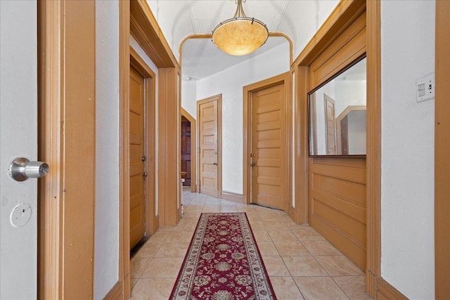 hallway featuring light tile patterned flooring