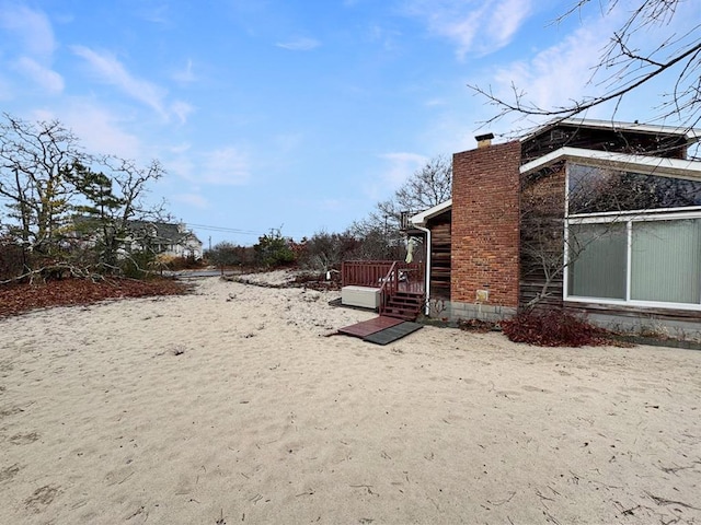 65 Lake Dr, Southold, NY 11971 - view of yard featuring a deck