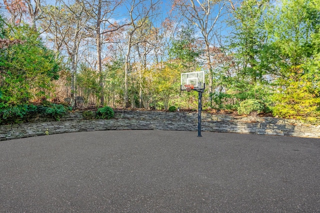 view of patio with basketball hoop