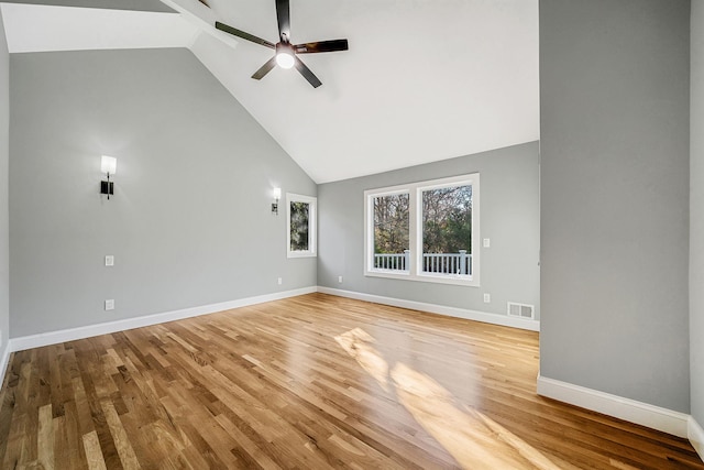 unfurnished living room featuring ceiling fan, high vaulted ceiling, and light hardwood / wood-style flooring