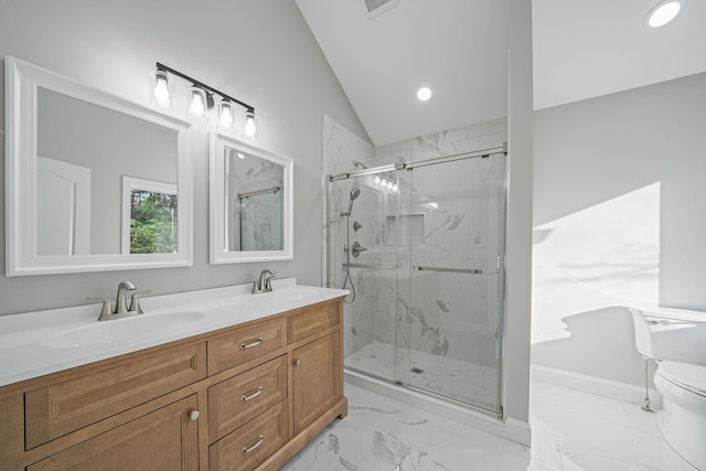 bathroom featuring vanity, toilet, a shower with door, and lofted ceiling