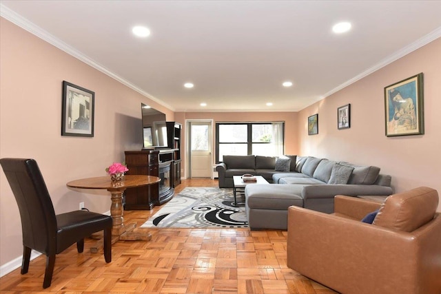 living room featuring crown molding and light parquet floors