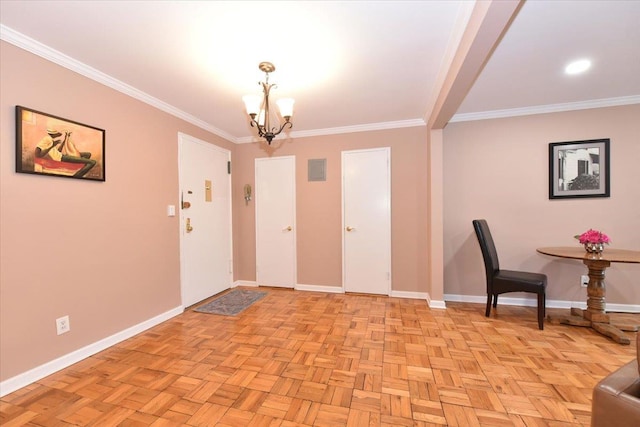 entrance foyer featuring a notable chandelier, crown molding, and light parquet floors