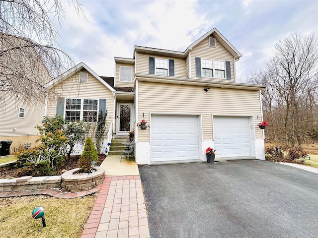 view of front of property featuring a garage