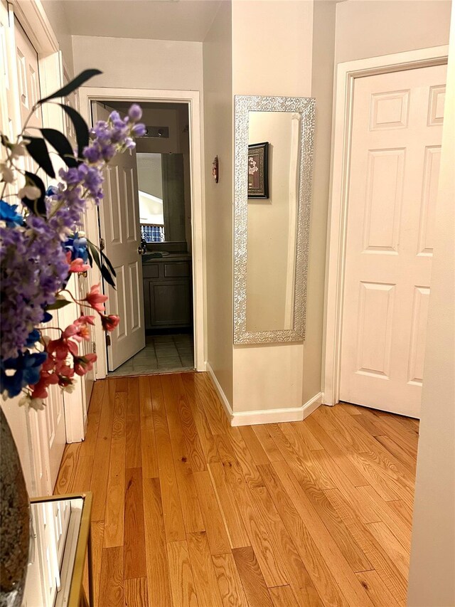 hall featuring light wood-type flooring