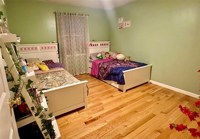 bedroom featuring light hardwood / wood-style flooring