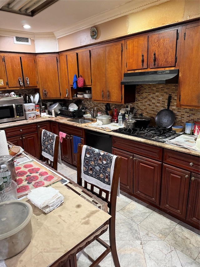 kitchen with tasteful backsplash, black gas stovetop, ornamental molding, and sink