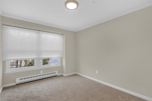 unfurnished room featuring carpet flooring, crown molding, and a baseboard radiator