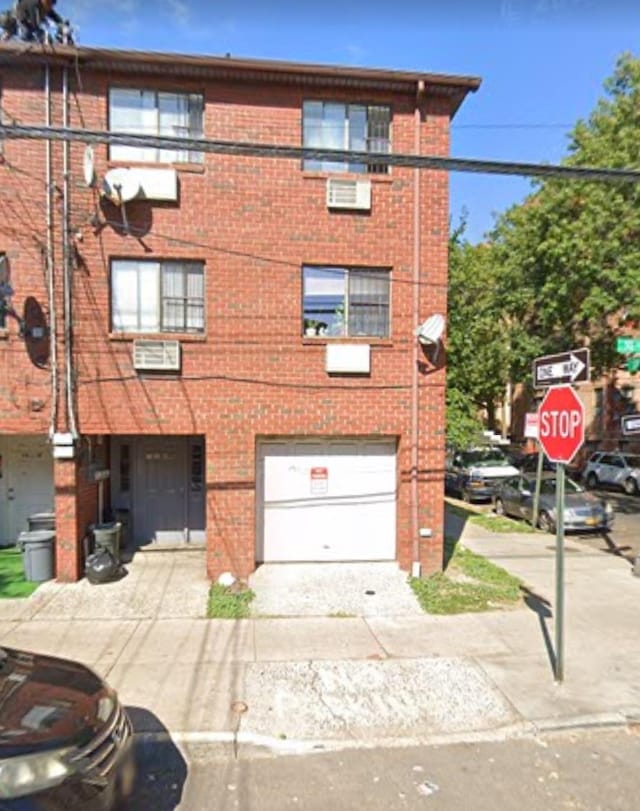 view of property featuring a garage