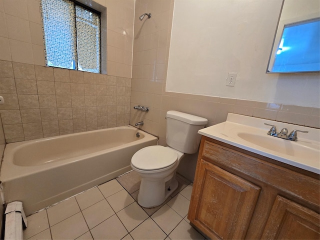 full bathroom with shower / bathing tub combination, tile patterned floors, toilet, and vanity
