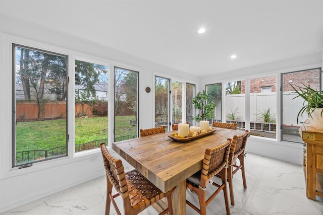 sunroom with plenty of natural light