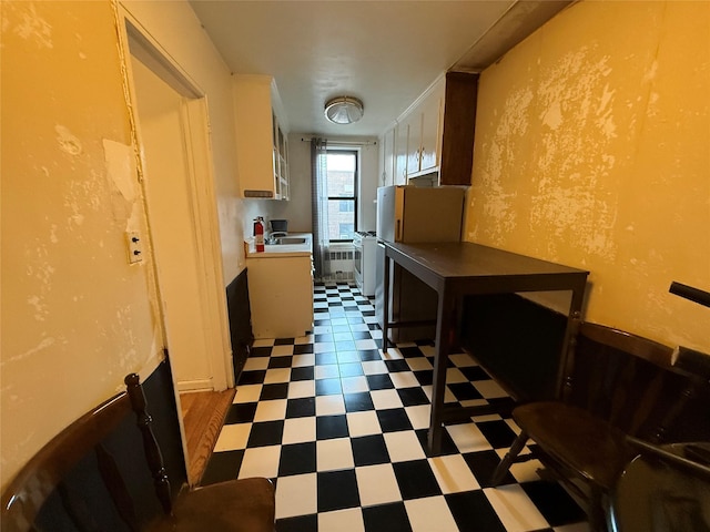 kitchen with white cabinetry