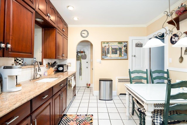 kitchen featuring dishwasher, crown molding, light tile patterned floors, and sink