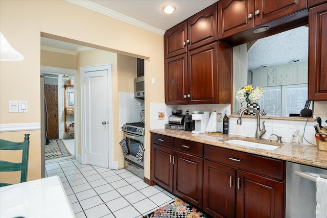 kitchen with sink, decorative backsplash, ornamental molding, light stone counters, and stainless steel appliances