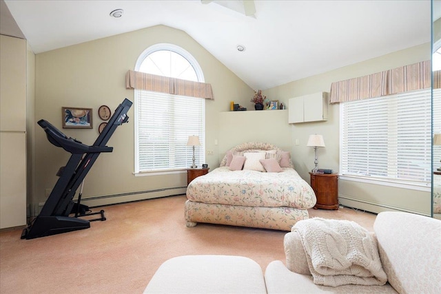 bedroom with light carpet, vaulted ceiling, and baseboard heating