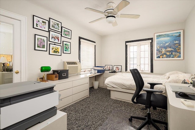 carpeted bedroom featuring ceiling fan