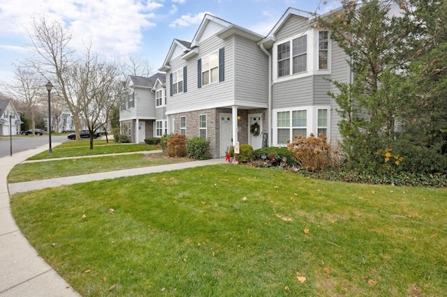 view of property with a front yard