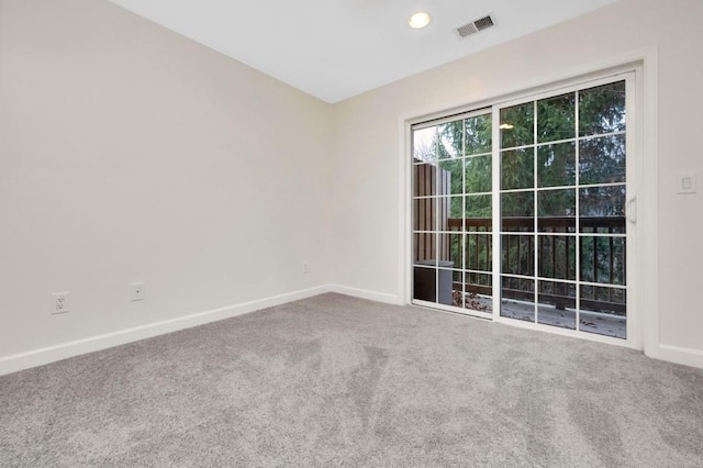 view of carpeted spare room