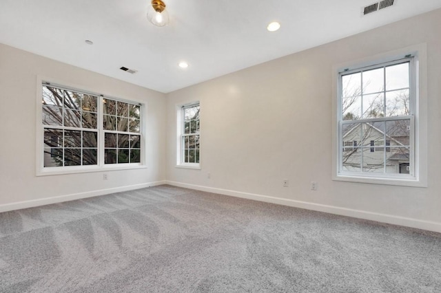 empty room featuring carpet flooring