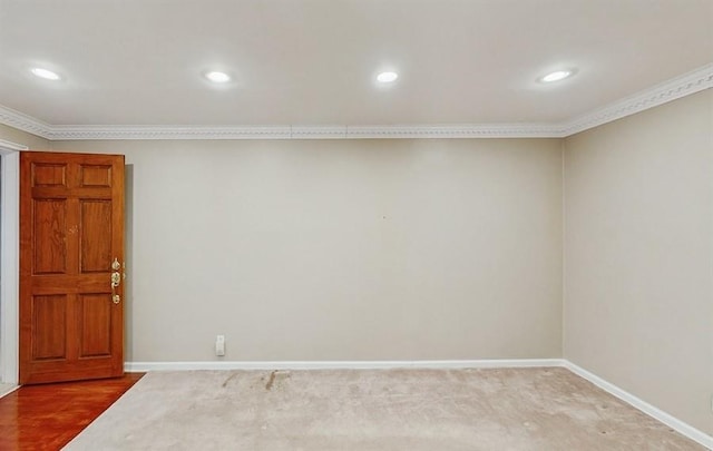 spare room featuring crown molding