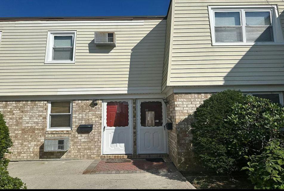 15 Harrison Ave Unit 60G, Amityville, NY 11701 - entrance to property featuring brick siding