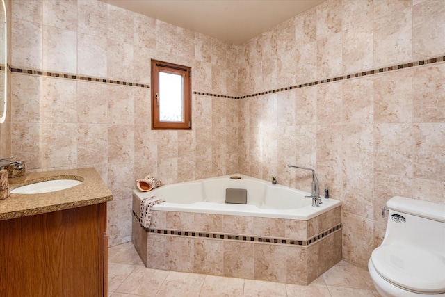 bathroom featuring tile patterned floors, toilet, and tile walls