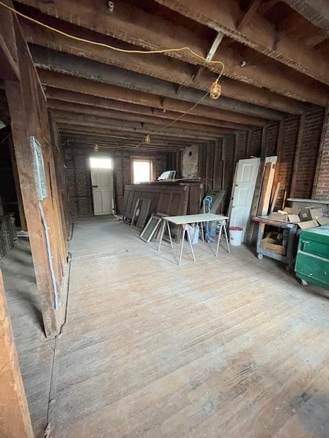 basement featuring hardwood / wood-style flooring