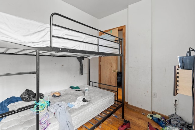 bedroom featuring hardwood / wood-style flooring