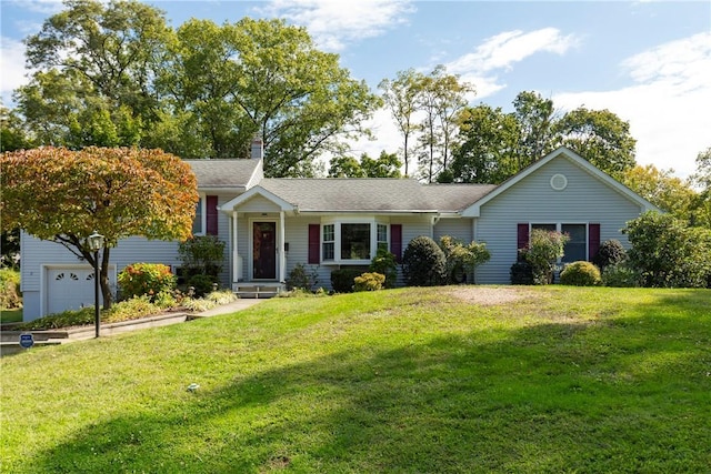 single story home with a garage and a front lawn