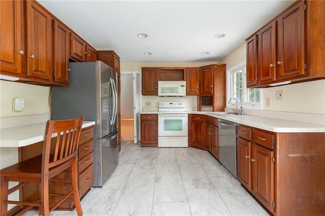 kitchen with sink and stainless steel appliances