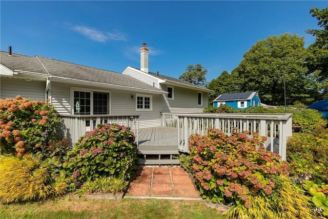 rear view of house with a deck