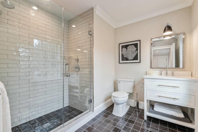 bathroom with vanity, crown molding, tile patterned flooring, toilet, and walk in shower