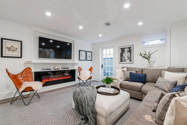 living room featuring light colored carpet and crown molding