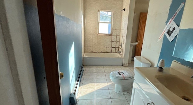 full bathroom with tile patterned flooring, vanity, toilet, and tiled shower / bath combo