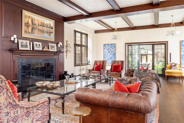 living room with hardwood / wood-style floors and beam ceiling