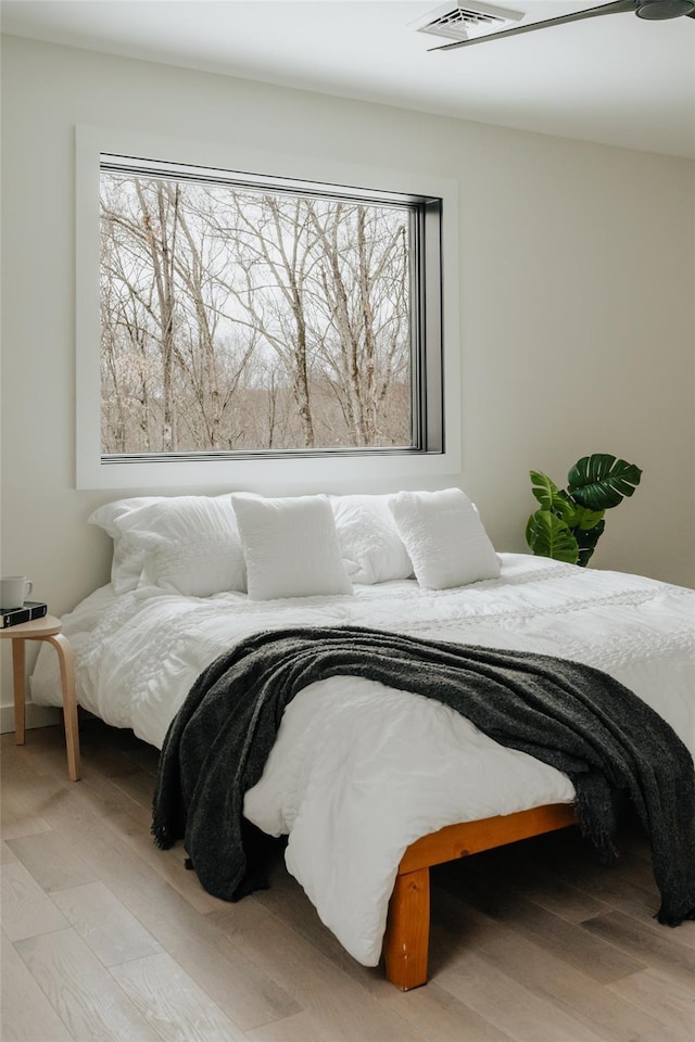 bedroom featuring light hardwood / wood-style flooring