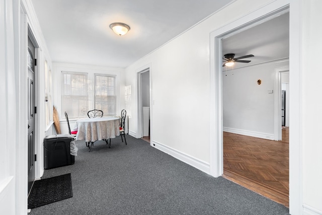 hallway featuring dark parquet flooring