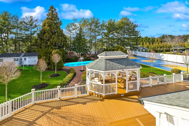 deck with a gazebo and basketball hoop