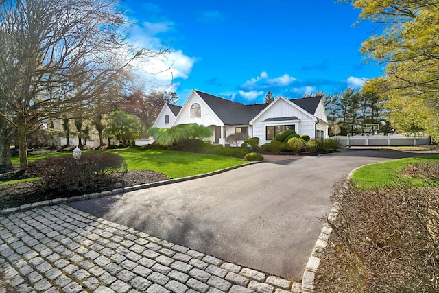 view of front of property with a front lawn