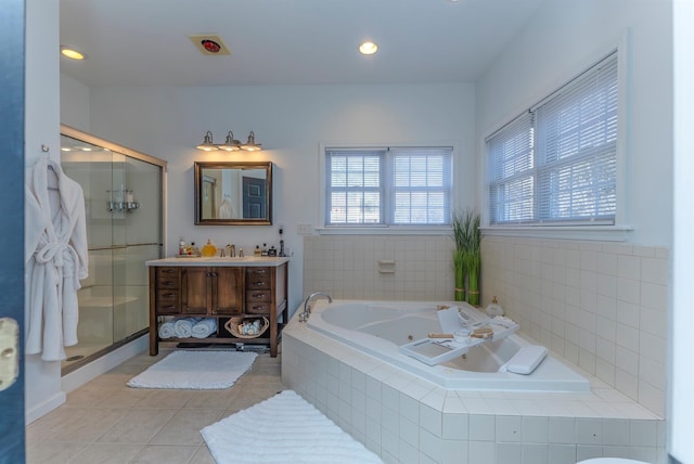 bathroom with vanity, tile patterned floors, and separate shower and tub