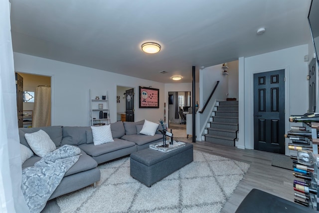 living room with hardwood / wood-style flooring