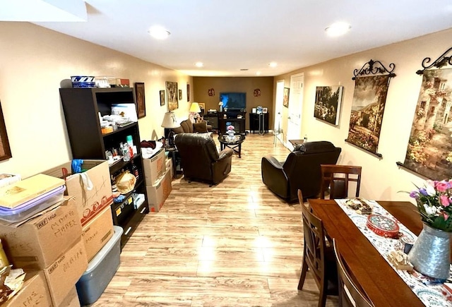 interior space featuring light wood-style floors and recessed lighting