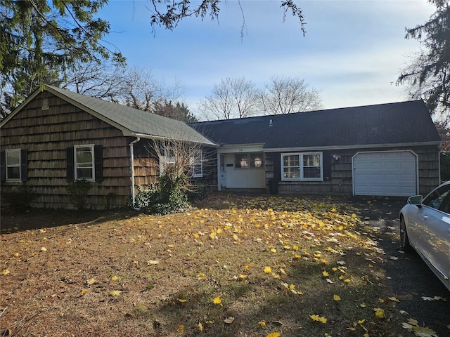 single story home with a garage