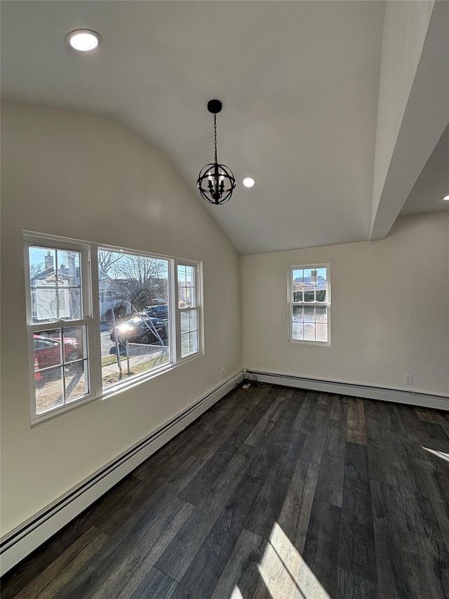 interior space with lofted ceiling, dark wood-type flooring, a wealth of natural light, and a baseboard radiator