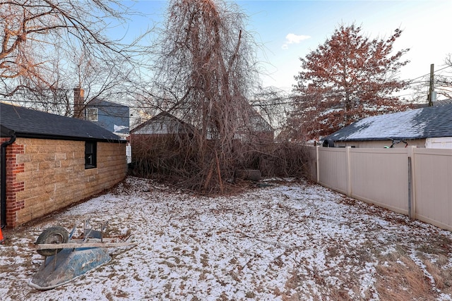 view of snowy yard